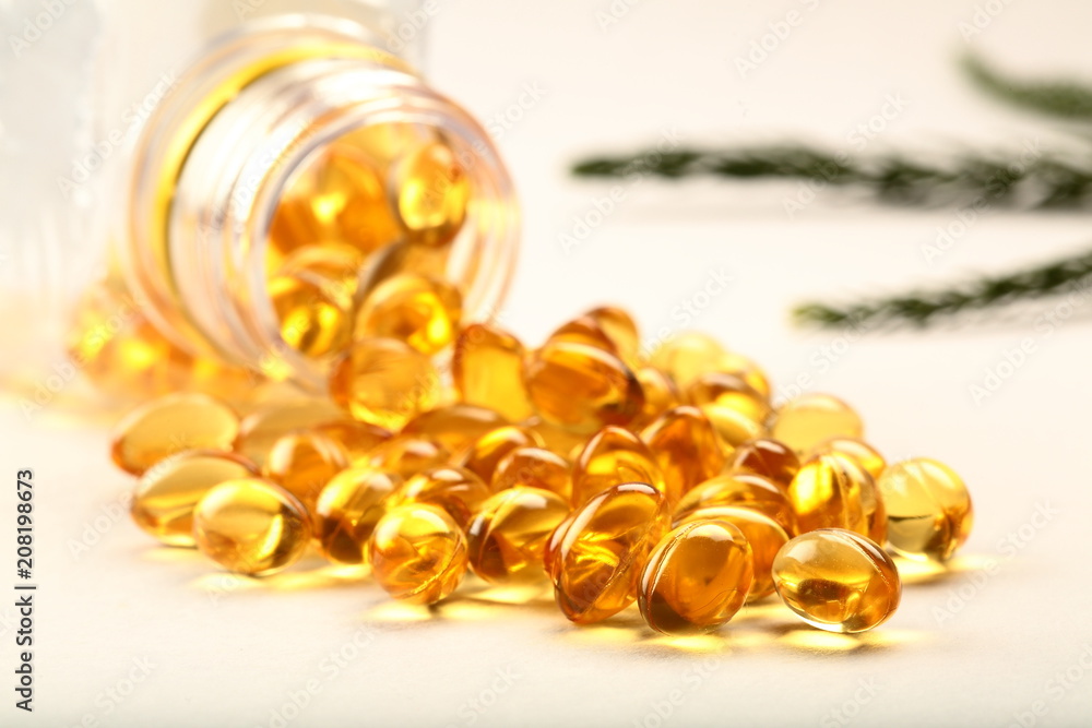 Bottle of cod fish oil capsules. Bottle of cod fish oil capsules.