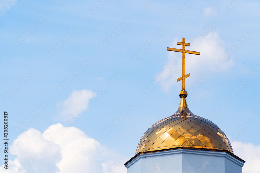 Orthodox cross on dome of church