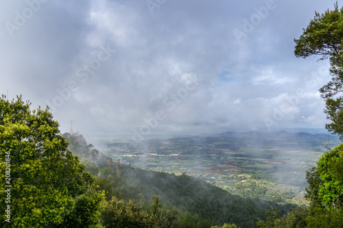 Mallorca  Misty atmosphere with sunshine on mountain of Sant Salvador