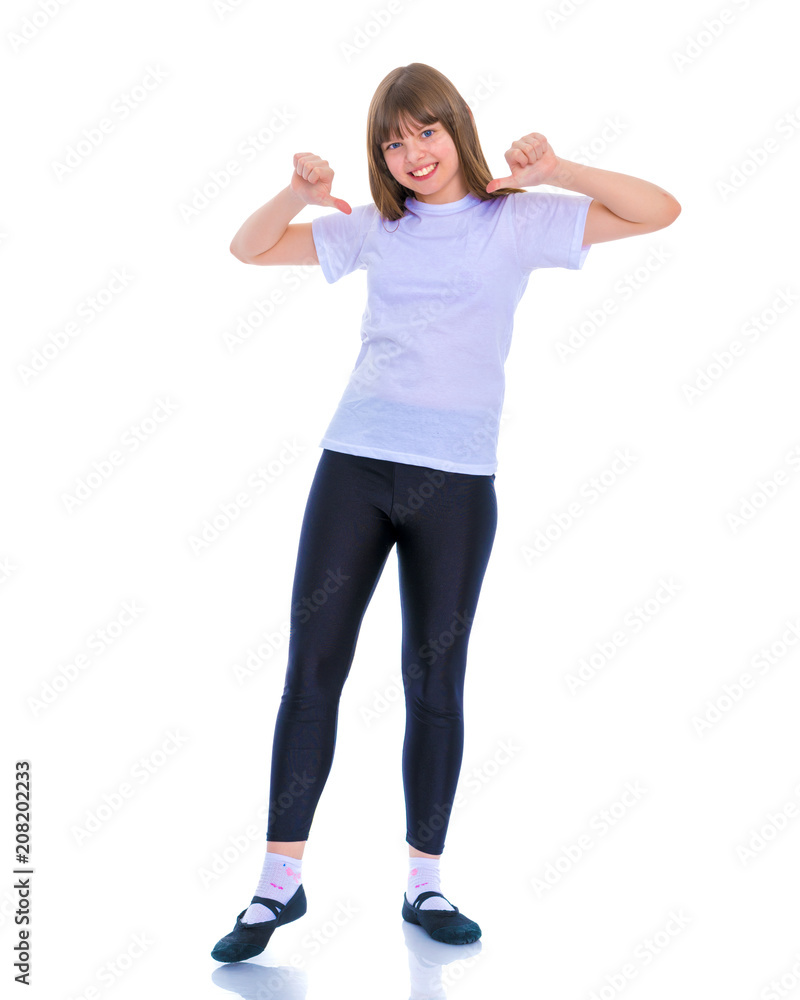 Little school girl pointing to her empty white t-shirt. Little school girl pointing to her empty white t-shirt.