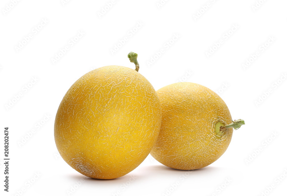 Fototapeta premium Fresh cantaloupe melons isolated on white background