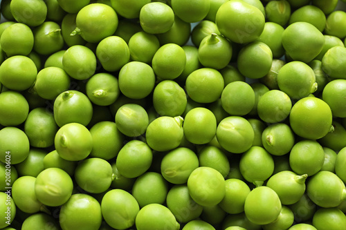 Many fresh green peas as background, top view © New Africa
