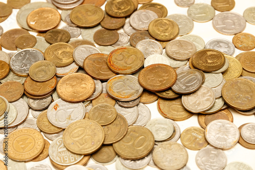 The texture of Russian coins, a large number of coins, Russian rubles and kopecks.