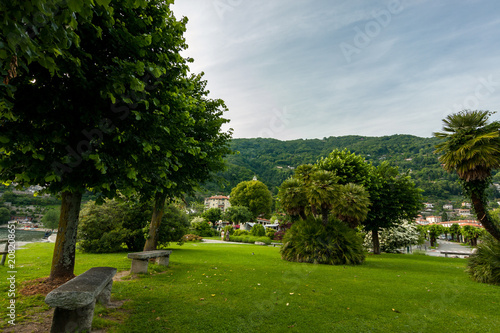 Garden on the shore of Lake Maggiore, tourist on the Cannero Riviera Beach photo