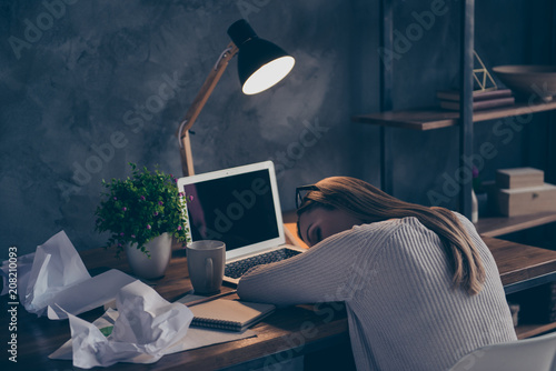 Fotografija Portrait of sleepy bored accountant sleeping on keyboard sitting at desktop in work place station tired from routine, from early morning till late night