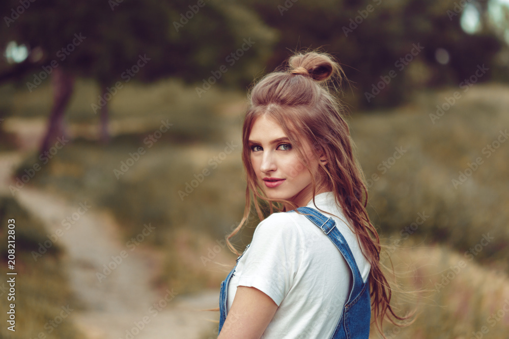 Outdoors portrait of beautiful young girl