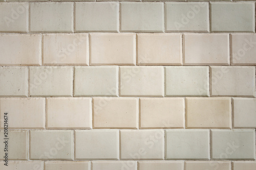 Texture. Wall of white decorative rectangular tiles