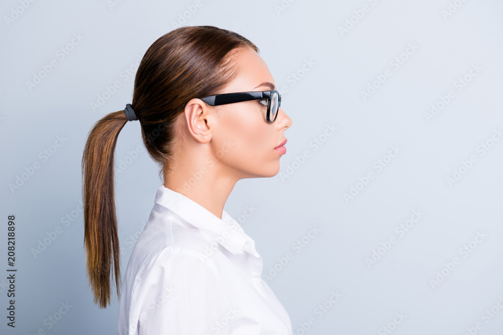Half-faced close up portrait of elegant serious strict focused concentrated clever intelligent style trendy stylish glamorous lawyer wearing white blouse isolated on gray background copy-space Half-faced close up portrait of elegant serious strict focused concentrated clever intelligent style trendy stylish glamorous lawyer wearing white blouse isolated on gray background copy-space