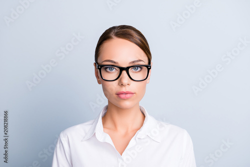 Close up portrait of attractive tempting clever experienced qualified expert strict cute lovely charming focused concentrated woman with half-open mouth eyewear white blouse isolated gray background