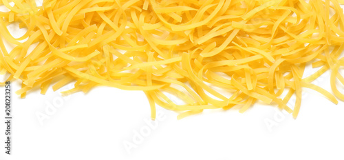 Heap of raw pasta on white background