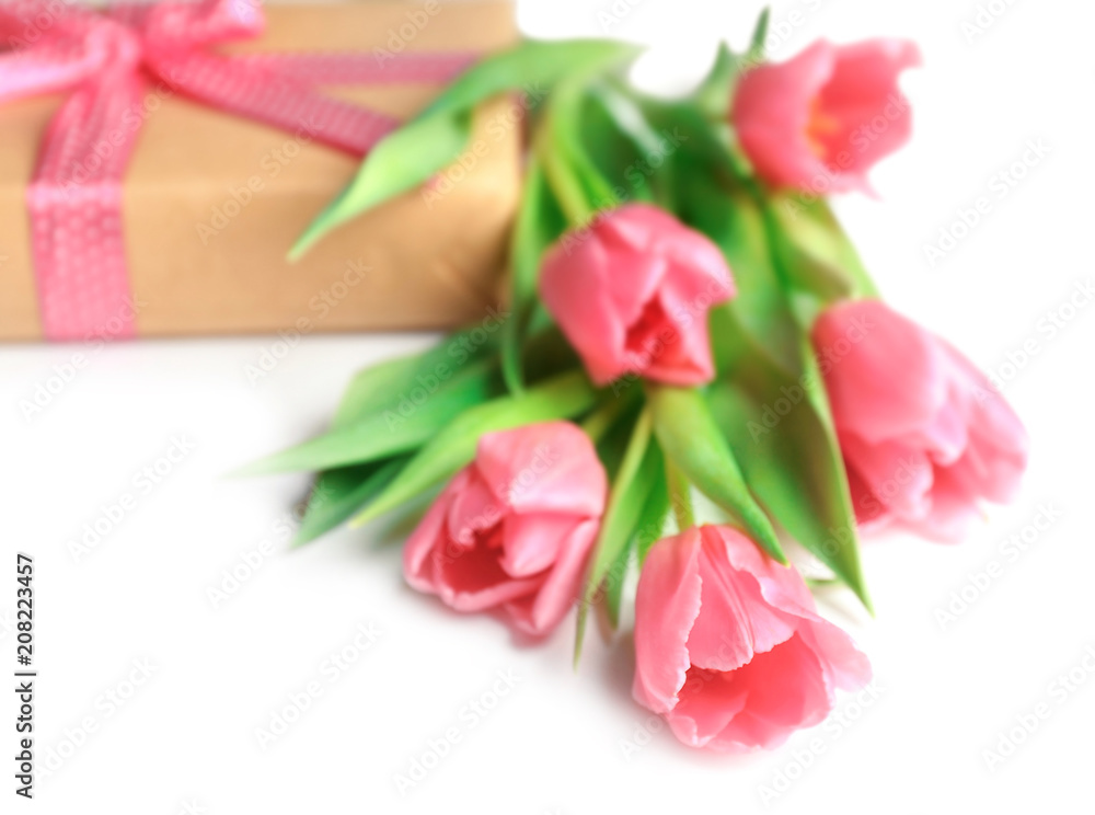 Bouquet of beautiful tulips and gift box on white background Bouquet of beautiful tulips and gift box on white background