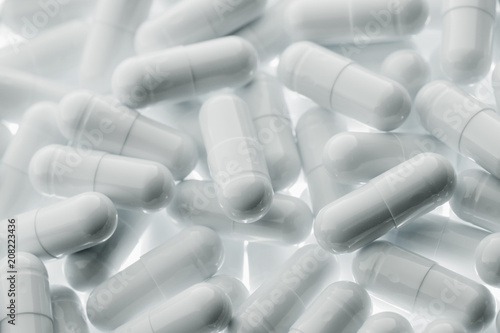 White pills capsules. Medicine and pharmacy concept.