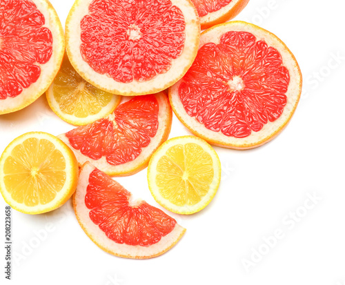 Delicious citrus fruits on white background