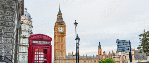 Central London, England with famous landmark sights Big Ben and parliament in Westminster