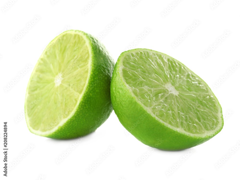 Cut citrus fruit on white background