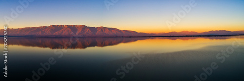 Aerial view of the artificial lake Kerkini and her mountain range at sunset at the north Greece