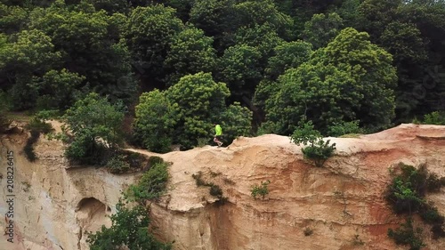 Trail running in a canyon drone video