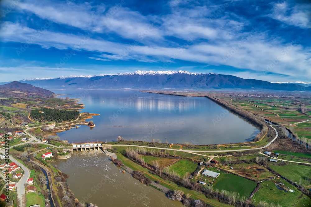 Aerial view of the artificial lake Kerkini and river Strymon with dam at the north Greece