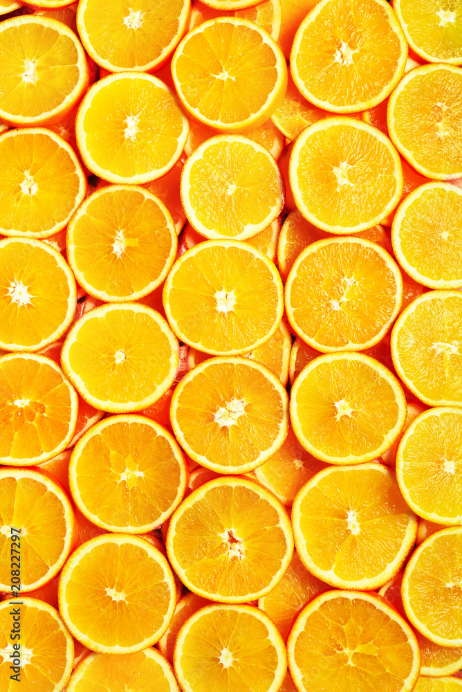 Creative pattern. Fresh sliced orange fruit texture. Macro, top view with copy space. Food frame. Juicy oranges background. banner Creative pattern. Fresh sliced orange fruit texture. Macro, top view with copy space. Food frame. Juicy oranges background. banner