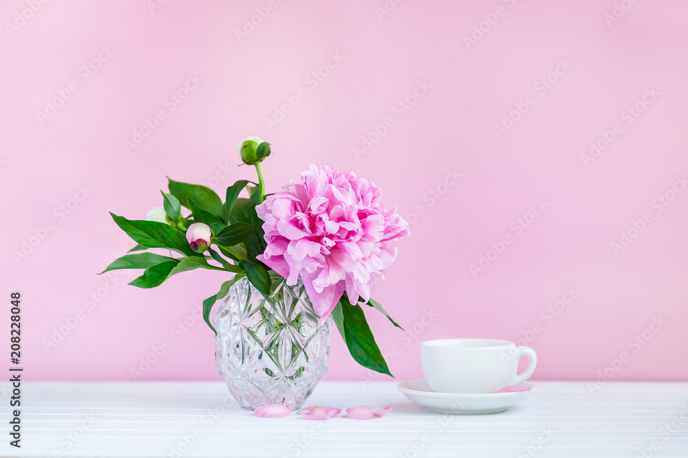 A cup of tea and peonies A cup of tea and peonies