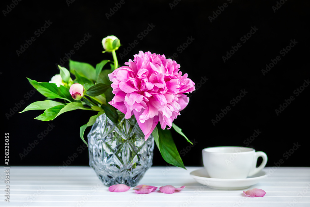 A cup of tea and peonies A cup of tea and peonies