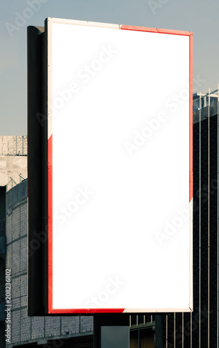 Blank vertical billboard on direct sunlight. photo