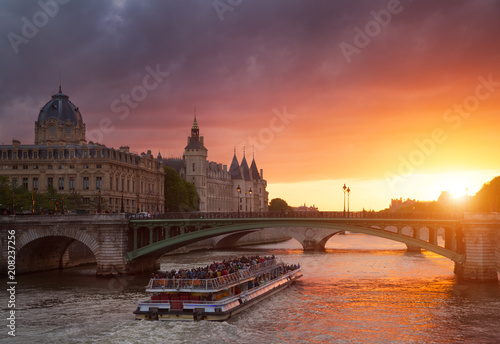 Conciergerie Building in Paris, France at sunset © Beboy