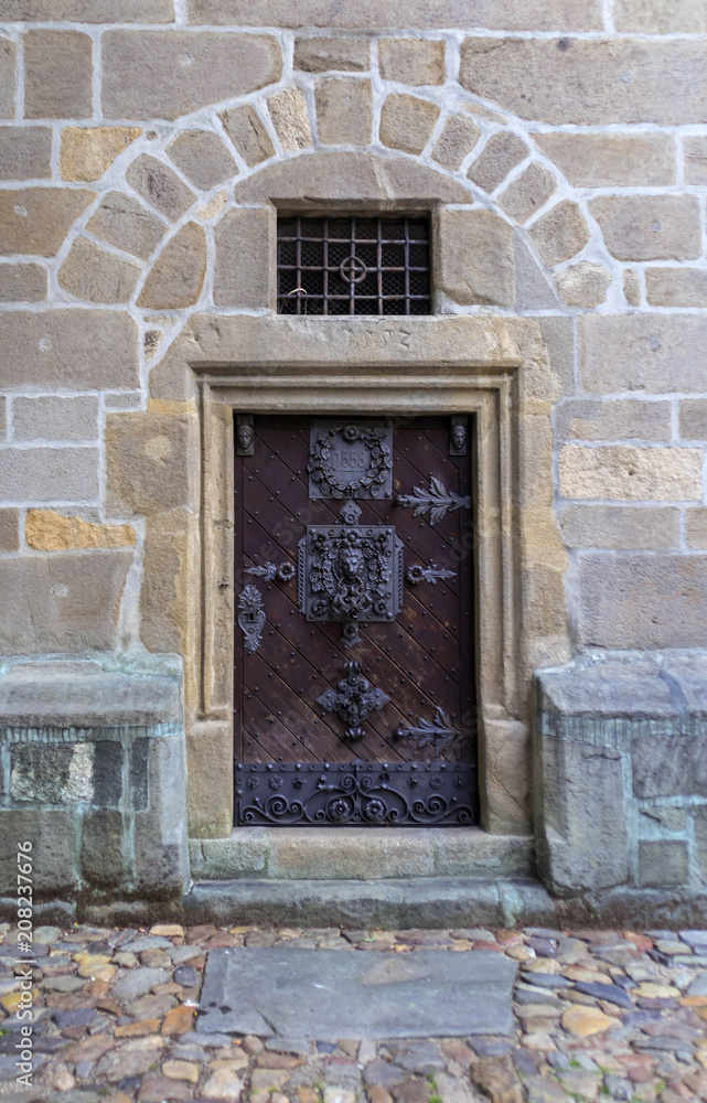 Wooden door of Black Tower in Ceske Budejovice, Czech republic Wooden door of Black Tower in Ceske Budejovice, Czech republic
