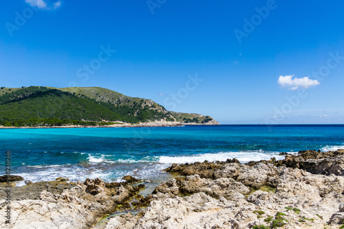 Mallorca, Rocky coast of bay Cala Agulla near Cala Ratjada at daytime © Simon