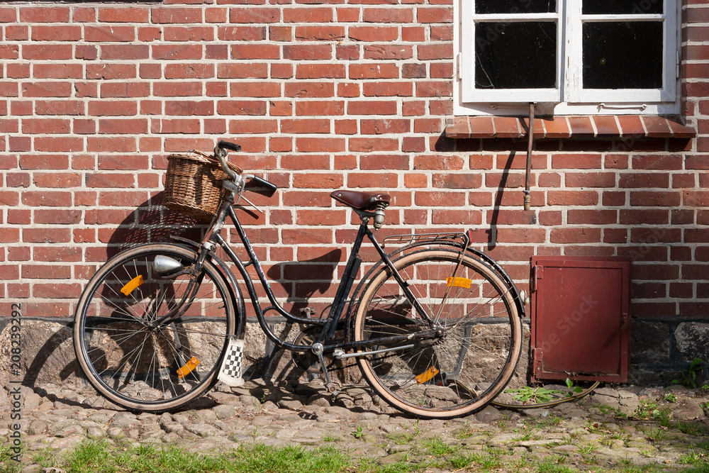 Vintage bike on a brick wall