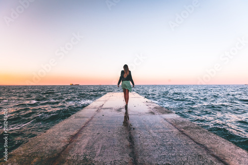 Girl on a pier