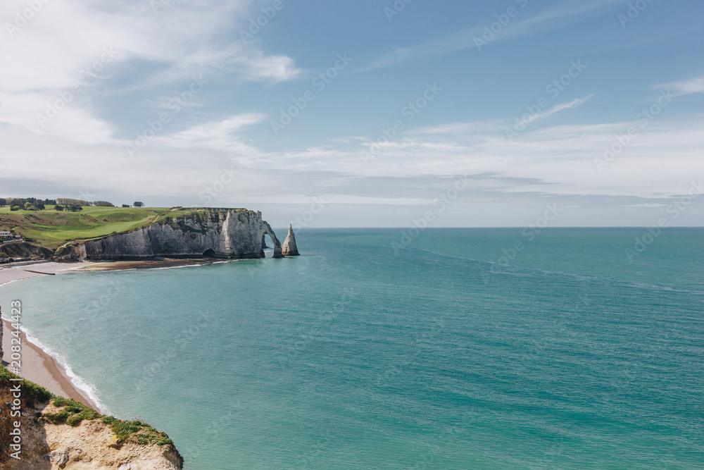 calm landscape with cliff and blue sea, Etretat, Normandy, France
