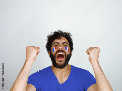 фотографія Sport fan screaming celebrating the triumph of his team