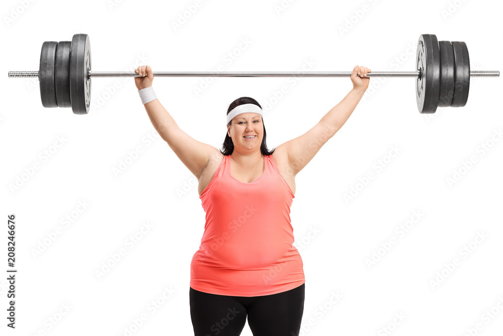 Overweight woman working out with a barbell Overweight woman working out with a barbell