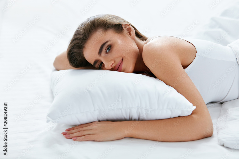 Woman With Pillow Resting On Bed Woman With Pillow Resting On Bed