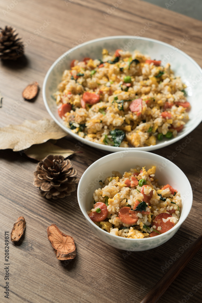 Fried rice with egg and wood grain background Fried rice with egg and wood grain background