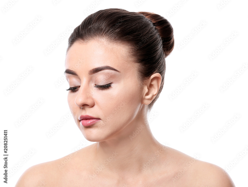 Beautiful young woman with silky skin after spa treatment on white background