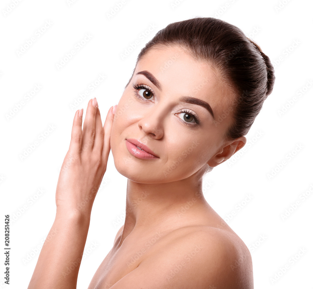 Beautiful young woman with silky skin after spa treatment on white background Beautiful young woman with silky skin after spa treatment on white background
