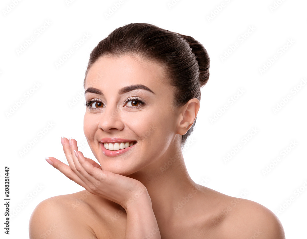 Beautiful young woman with silky skin after spa treatment on white background Beautiful young woman with silky skin after spa treatment on white background