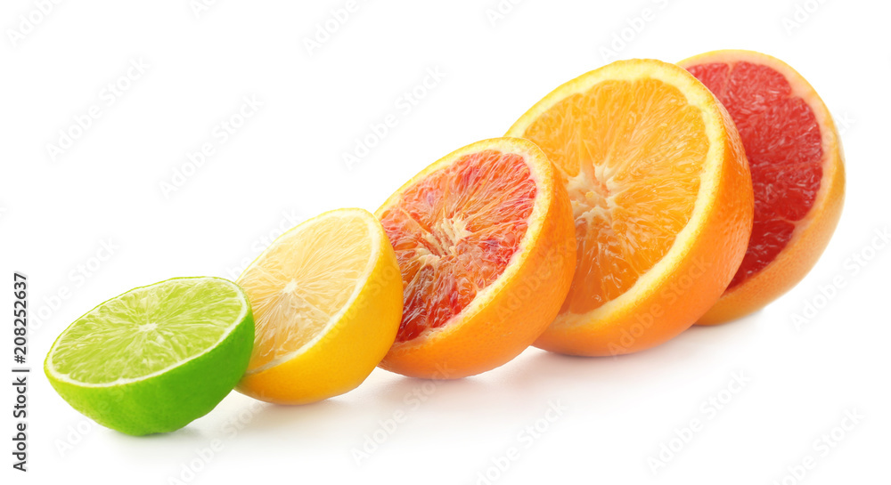 Tasty cut citrus fruits on white background Tasty cut citrus fruits on white background
