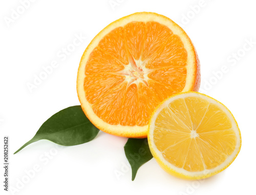 Tasty cut lemon and orange on white background
