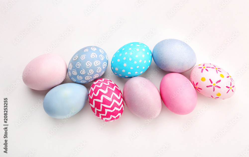 Dyed Easter eggs on white background