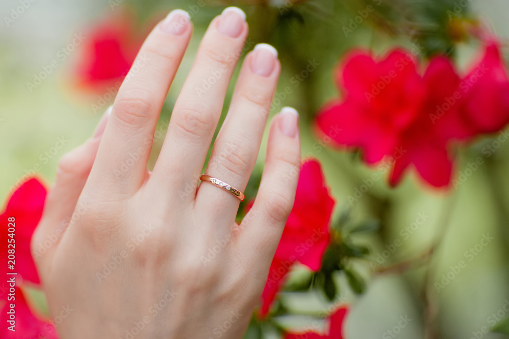 Fototapeta premium Beautiful wedding bride's ring and manicure.