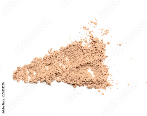 Crushed powder on white background. Professional cosmetics