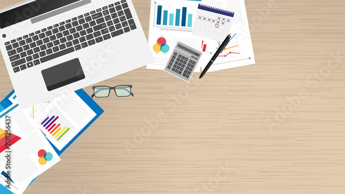 Top view of office workplace, office supplies, notebook. Charts, documents