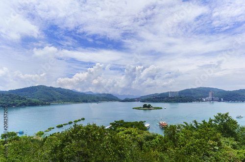 Beautiful scenery from Xuanguang Temple viewpoint viewing the famous Lalu Island located in the center of Sun moon lake , Nantou County , Taiwan