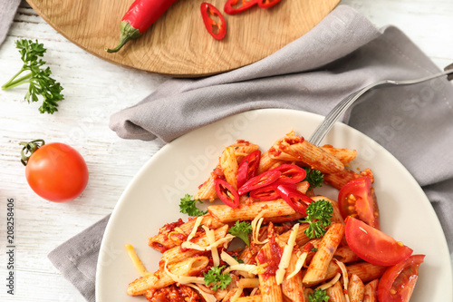 Spicy penne pasta with toma...