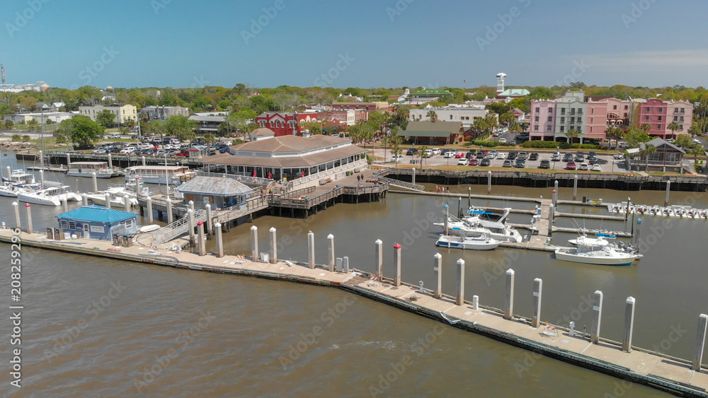 Obraz premium AMELIA ISLAND, FL - APRIL 1, 2018: Coastline of Fernandina Beach, aerial view. This is a famous attraction for tourists in Florida
