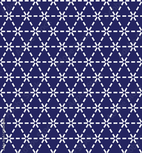 Japanese sashiko ornament. Asian embroidery motifs. Abstract seamless patterns. White stitches on the indigo blue background. For handicraft or decoration.