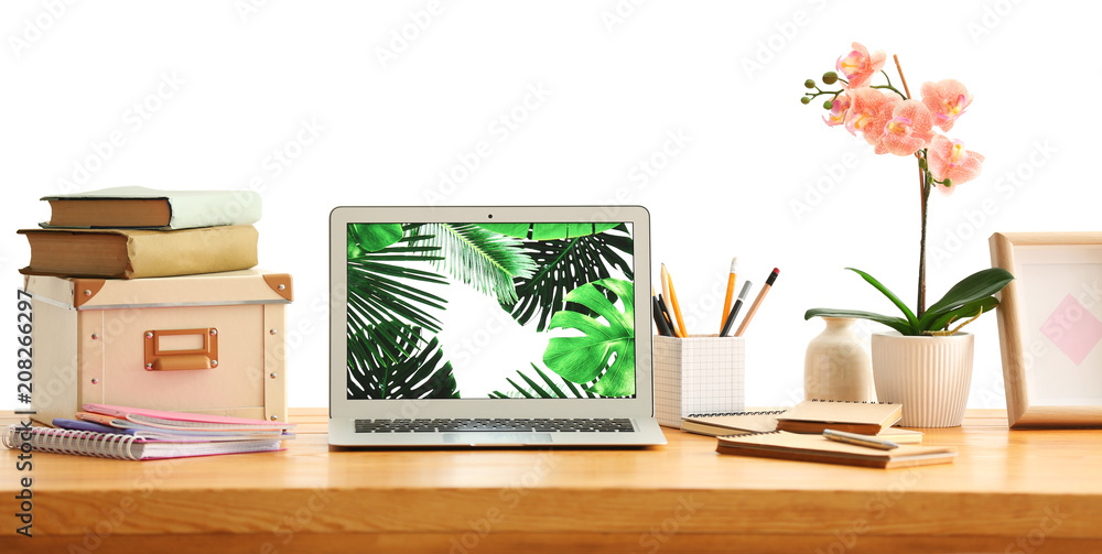 Fototapeta premium Comfortable home workplace with laptop on table
